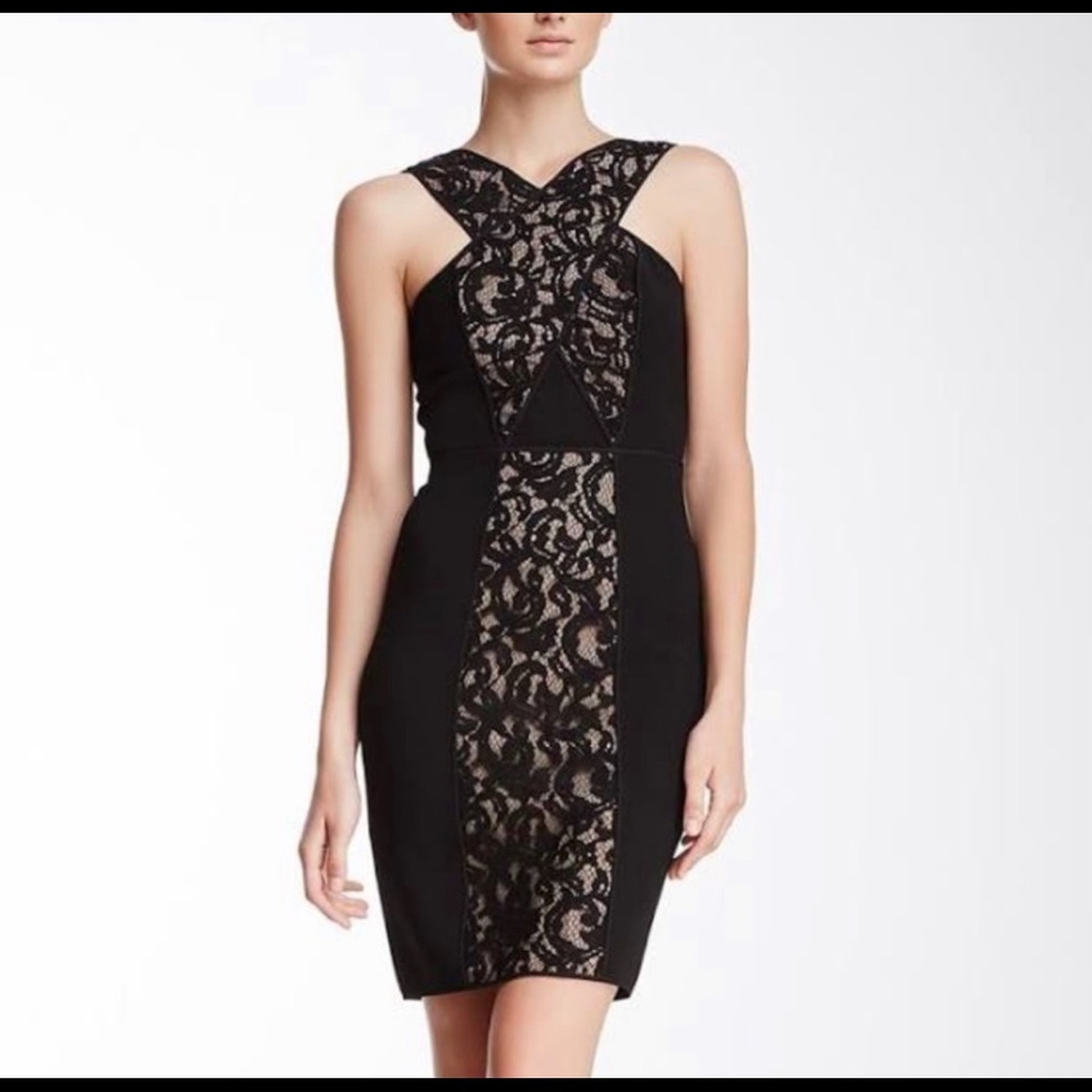 BCBG black figure hugging lace dress. Size 8. Brand new.